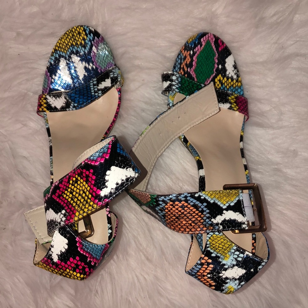 Mulitcolor faux Snakeskin open toe heels.